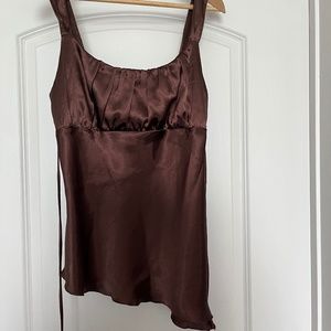 Asymmetrical sleeveless satin blouse